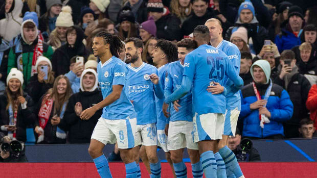 Manchester City's players pictured celebrating during a 3-2 win over RB Leipzig in UEFA Champions League Group G in November 2023